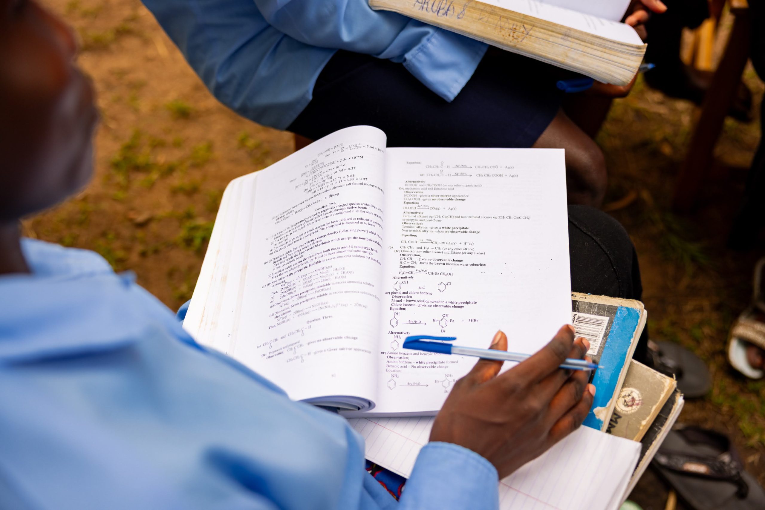 Student reading and taking notes