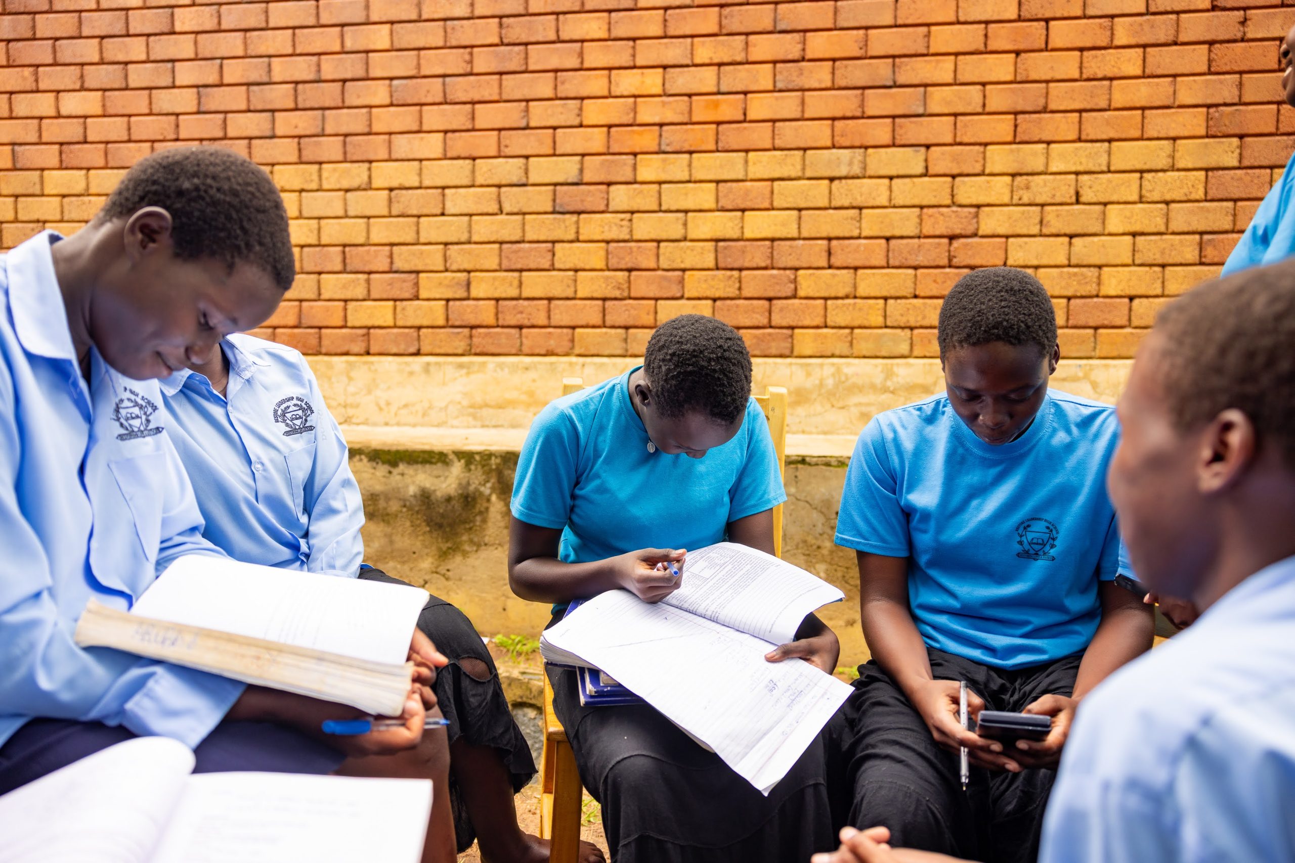 Students reading together in a learning space